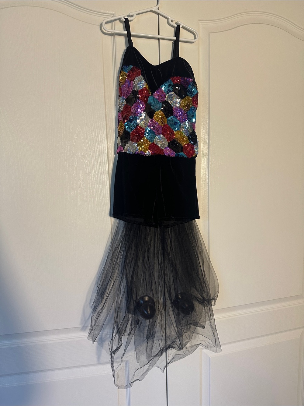 Dance costume. Lots of colors and lots of sequins. Black bow & train. Adult S